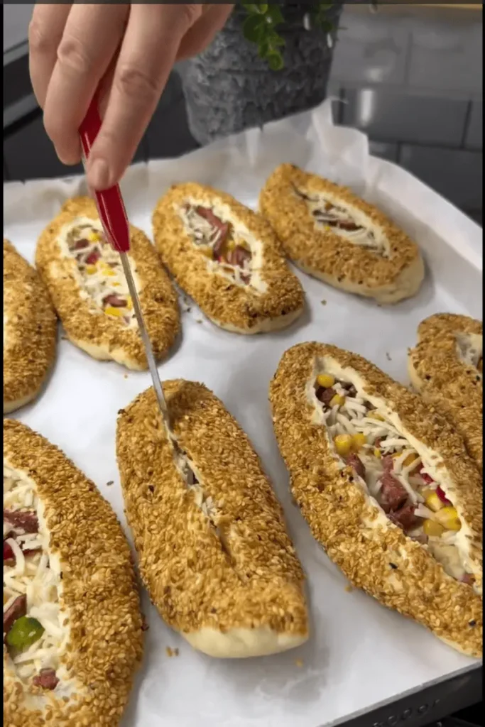 bagel buns with cheese and sausage