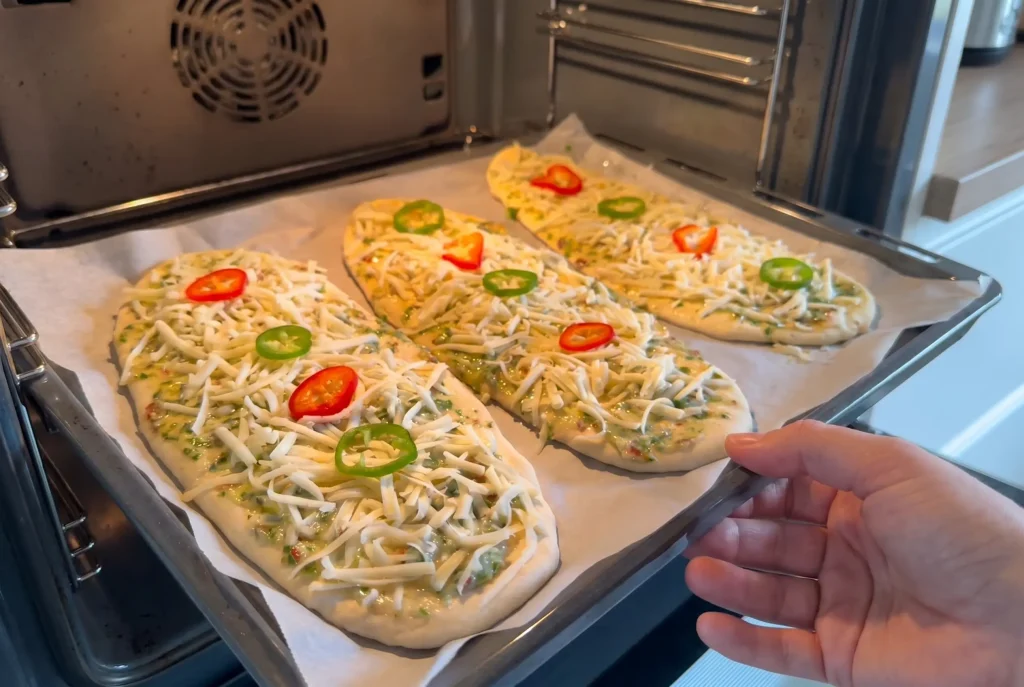 Homemade cheesy garlic bread with Kashar cheese and golden crust