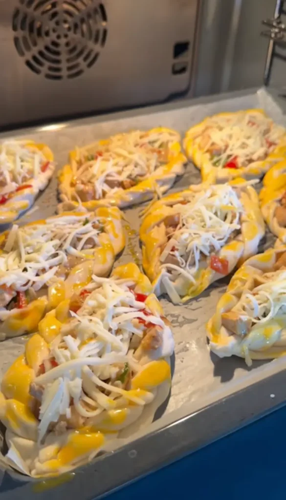 Golden baked chicken stuffed bread rolls fresh from the oven
