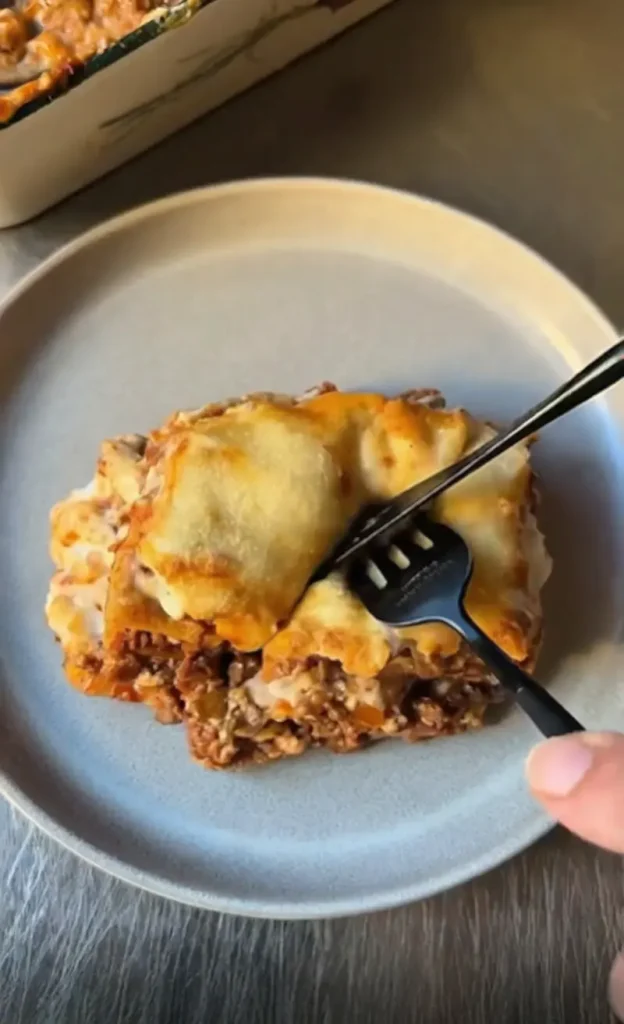 Homemade Lasagne alla Bolognese fresh from the oven with a crispy golden top