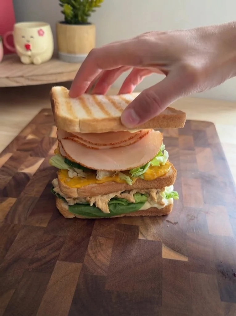 Toasted sandwich bread slices ready for assembling a club sandwich.