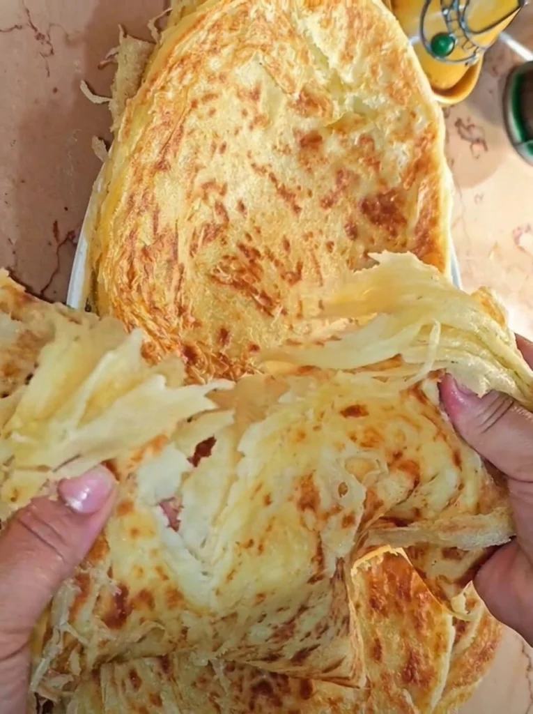 Crispy buttery Lachha Paratha fresh from the pan