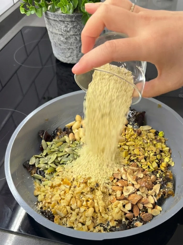 Dates, walnuts, peanuts, pistachios, sesame seeds, pumpkin seeds and sunflower seeds for homemade date bars