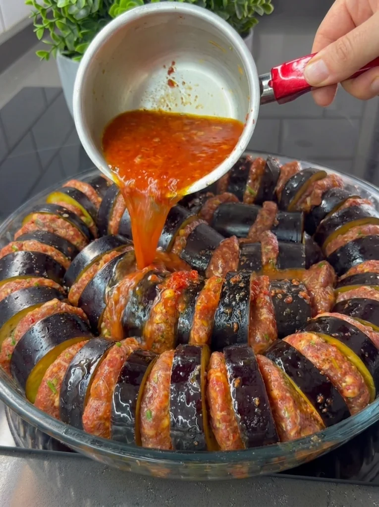 Eggplant kebab tray covered with oiled baking paper before oven