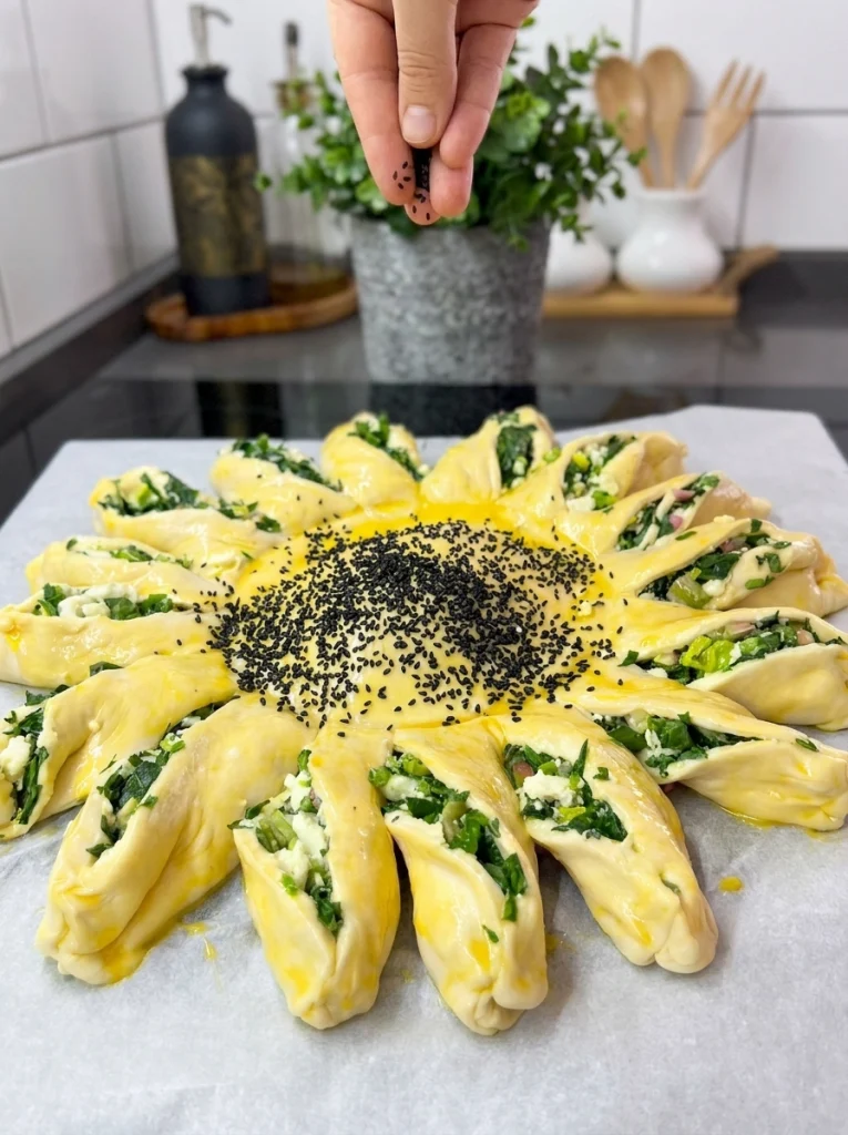 Spinach Sun Bun cut into sun shape design before baking