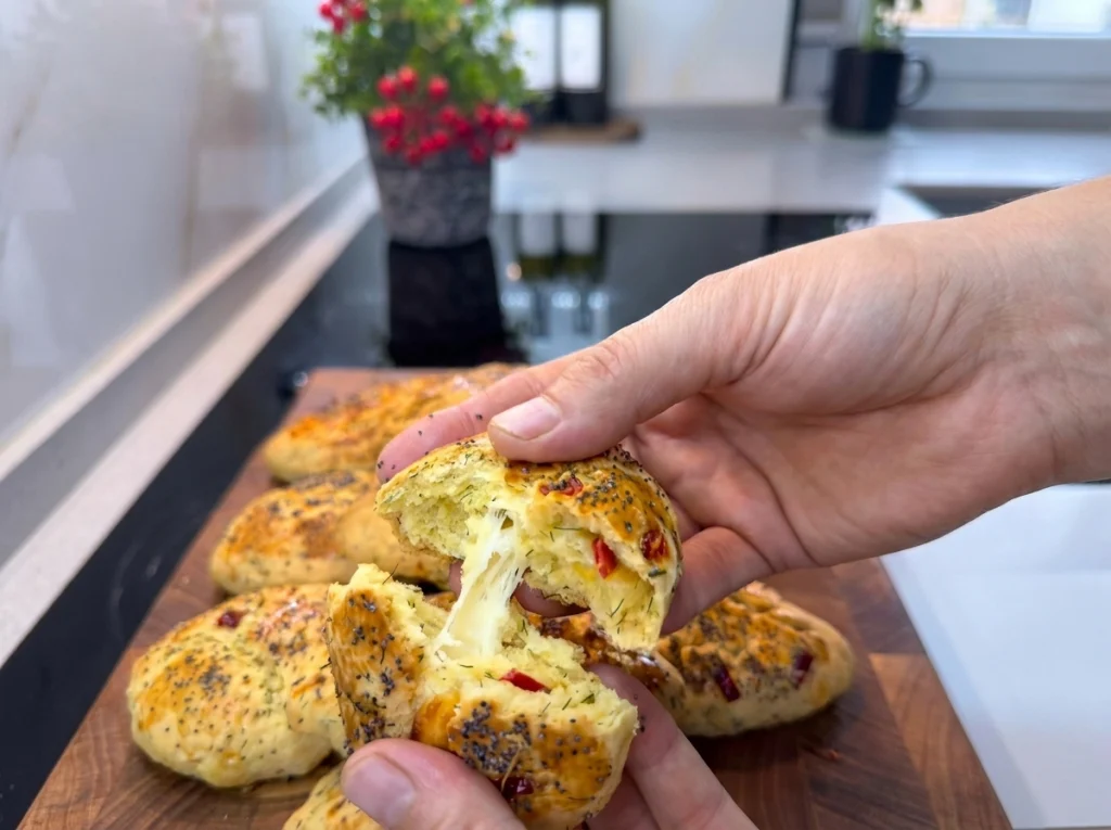 Biberli Derutelu Boğaça cheese stuffed savory buns on a tray