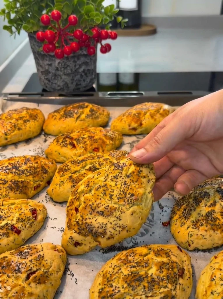 Close-up of cheese filling inside Biberli Derutelu Boğaça bun