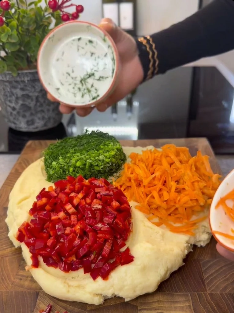 Mixing soft dough for Biberli Derutelu Boğaça buns