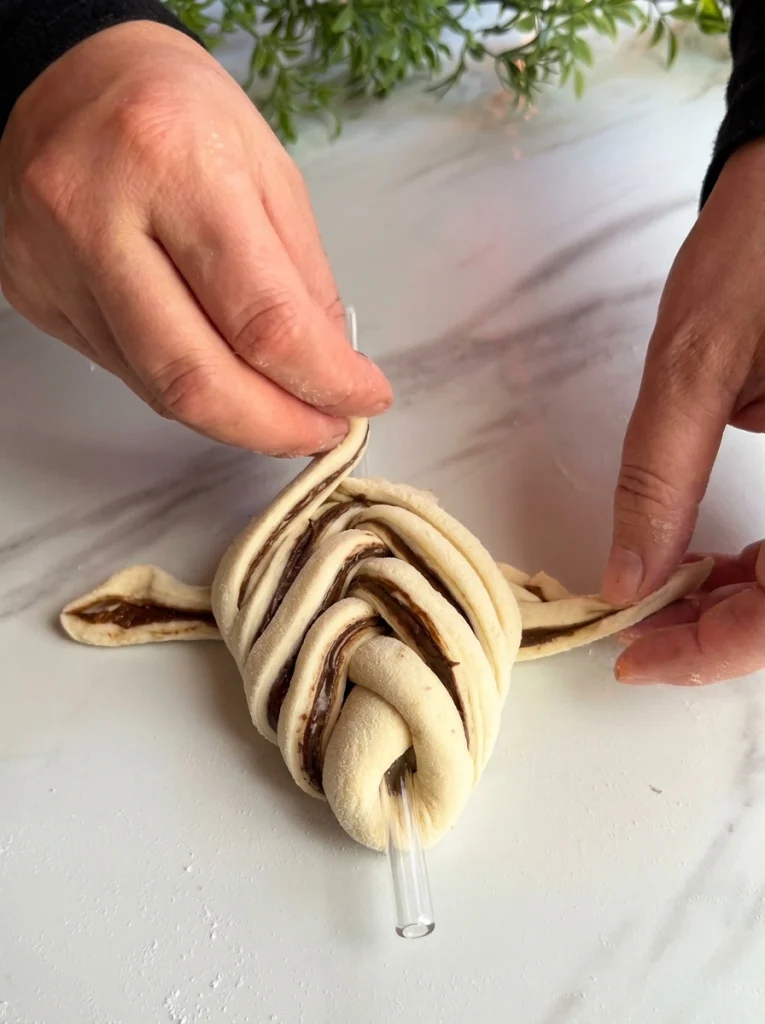 Bread dough rising in a covered bowl until doubled