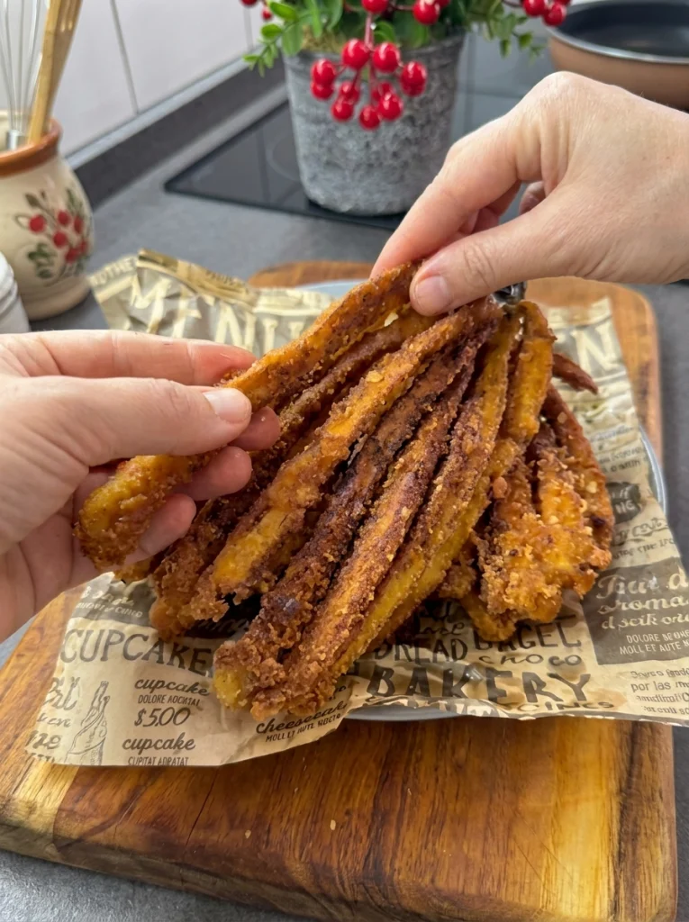 Close-up of crispy eggplant fry showing crunchy panko coating